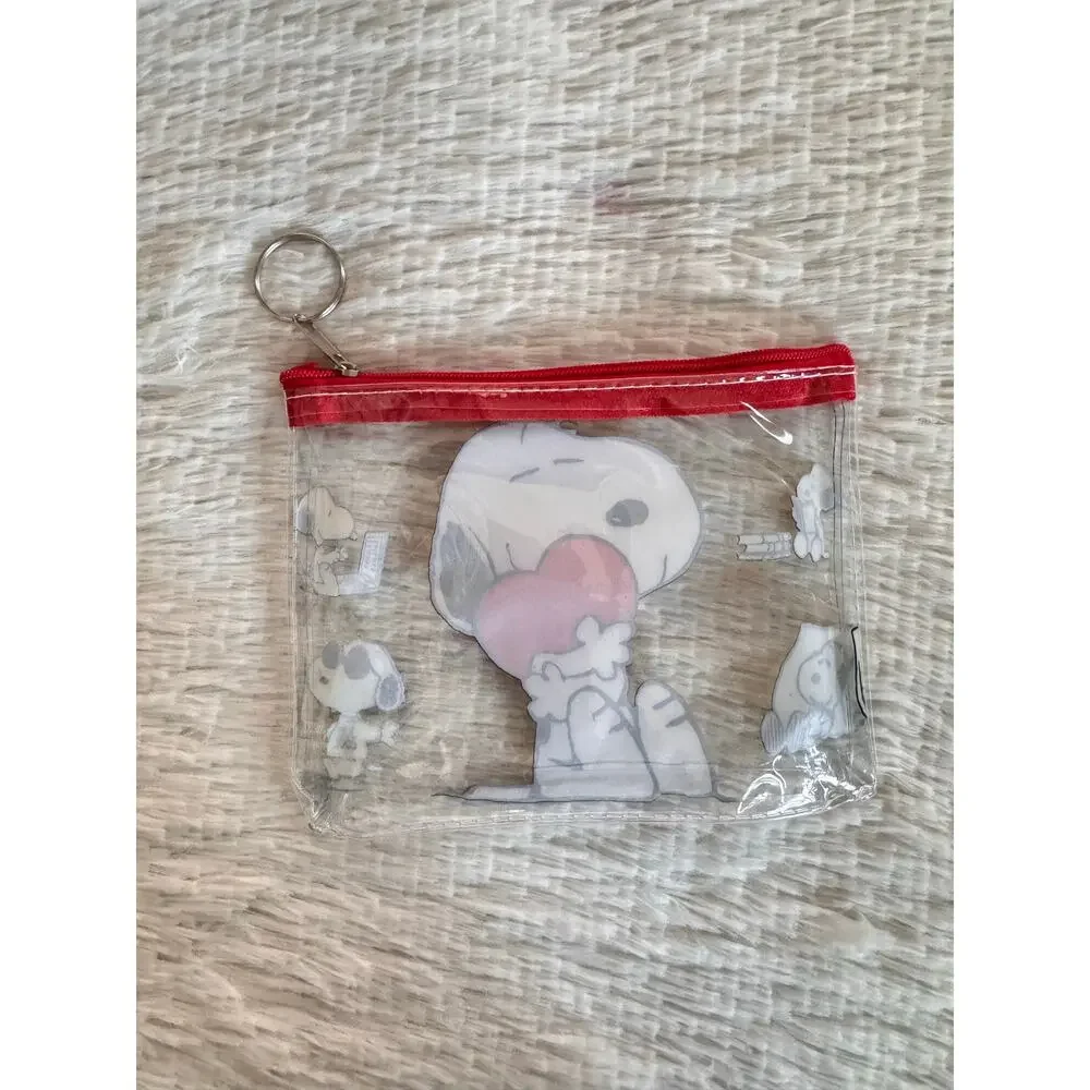 Snoopy clear pouch with Snoopy holding a red heart keychain zipper
